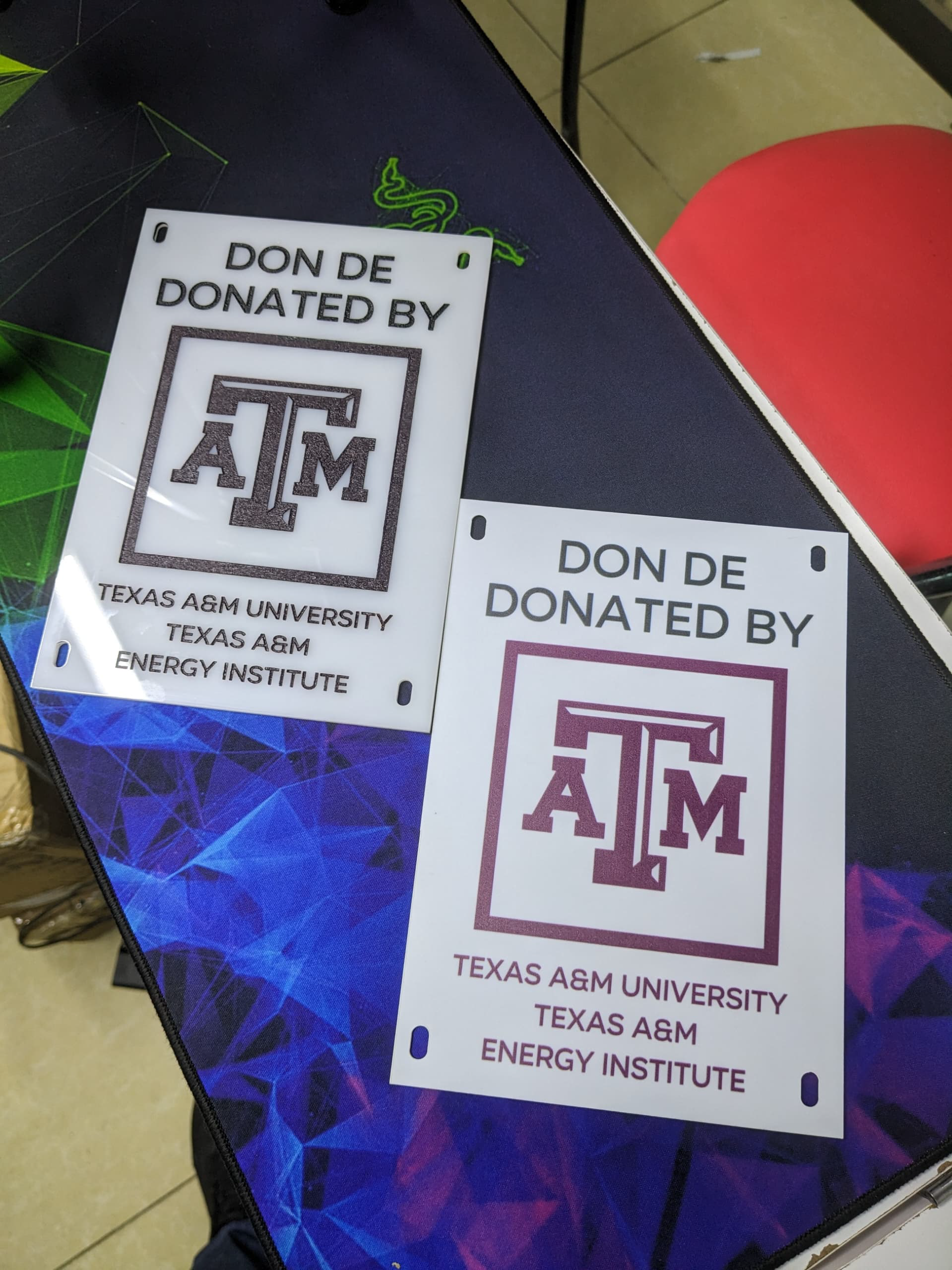 Signs to be installed in Goma on streetlights donated by the Texas A&M Energy Institute.