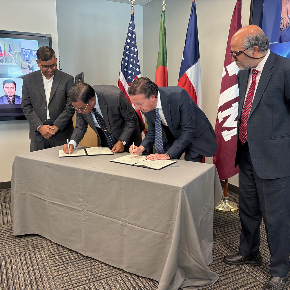 Memorandum of Understanding Signing Ceremony between the Texas A&M Energy Institute and the Bangladesh Energy Regulatory Commission. Pictured left to right: Dr. Faruque Hasan, the Assistant Director for Decarbonization for the Texas A&M Energy Institute and an Associate Professor of Chemical Engineering; Honorable Chairman of BERC, Jalal Ahmed; Dr. Stratos Pistikopoulos, the Director of the Texas A&M Energy Institute and a Professor of Chemical Engineering; and Dr. Faisal Khan, the Department Head for the Artie McFerrin Department of Chemical Engineering at Texas A&M University and the Director of TEES Mary Kay O'Connor Process Safety Center